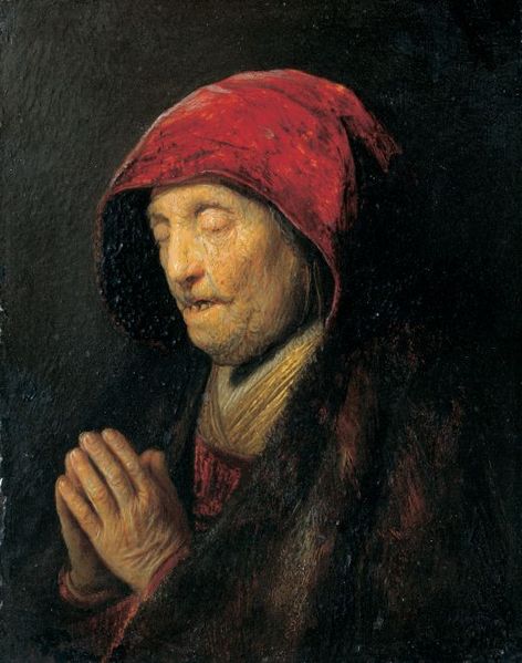 Bust of an old woman at prayer